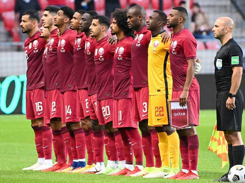 Qatar National Football Team With Referee