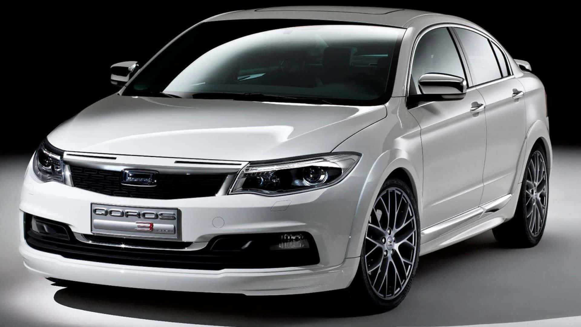 Sleek Qoros Sedan Driving is Style Wallpaper