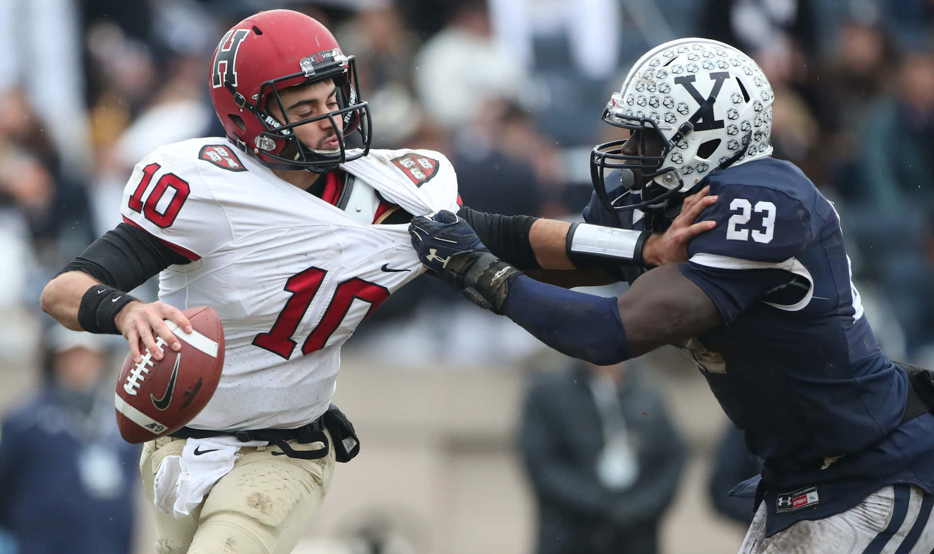 Quarterback_ Evading_ Defender Wallpaper