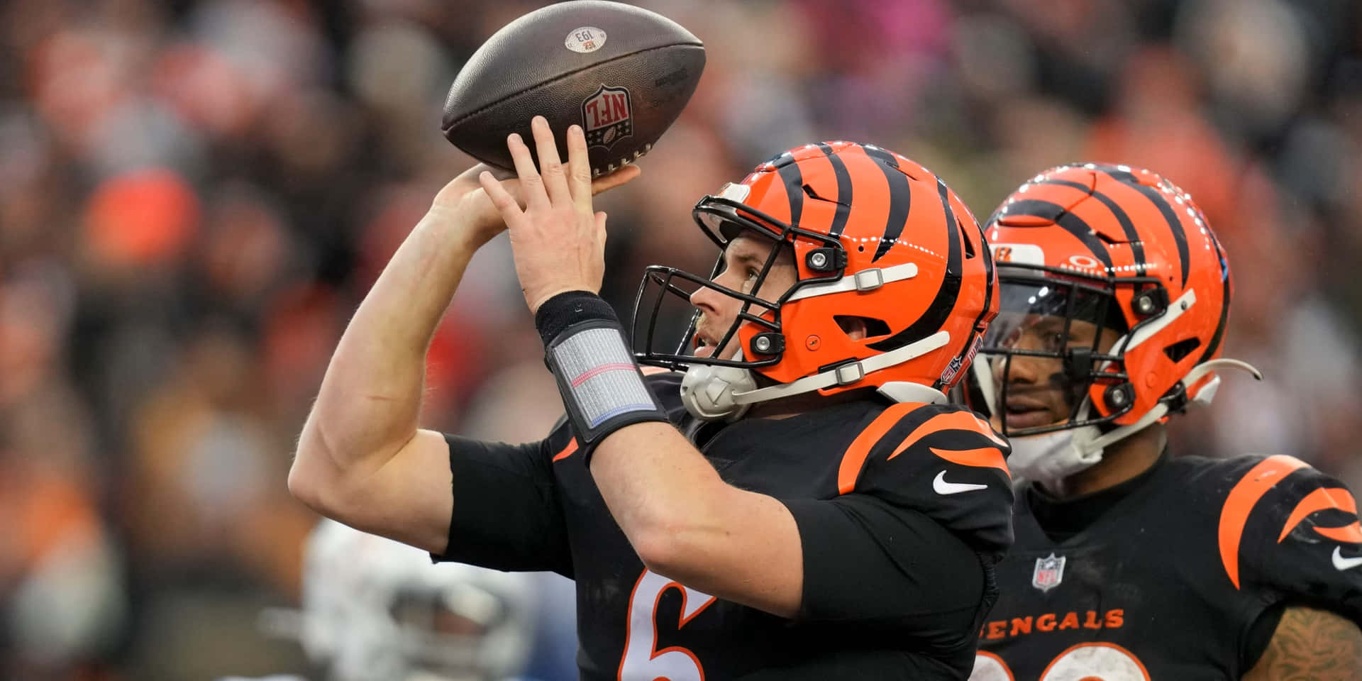 Quarterback Preparingto Throw Football Wallpaper