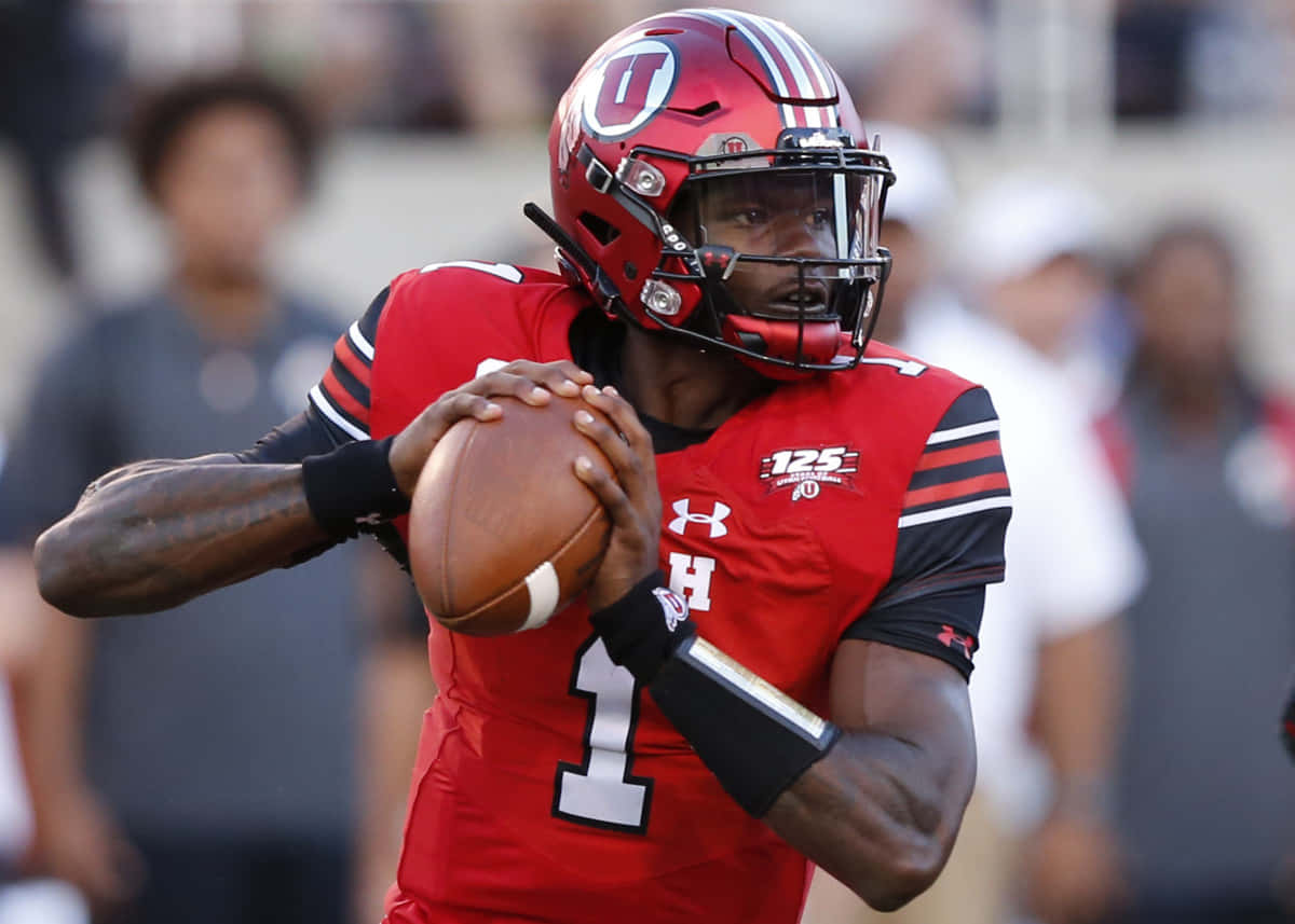 Quarterback Tyler Huntley Actiefoto Achtergrond