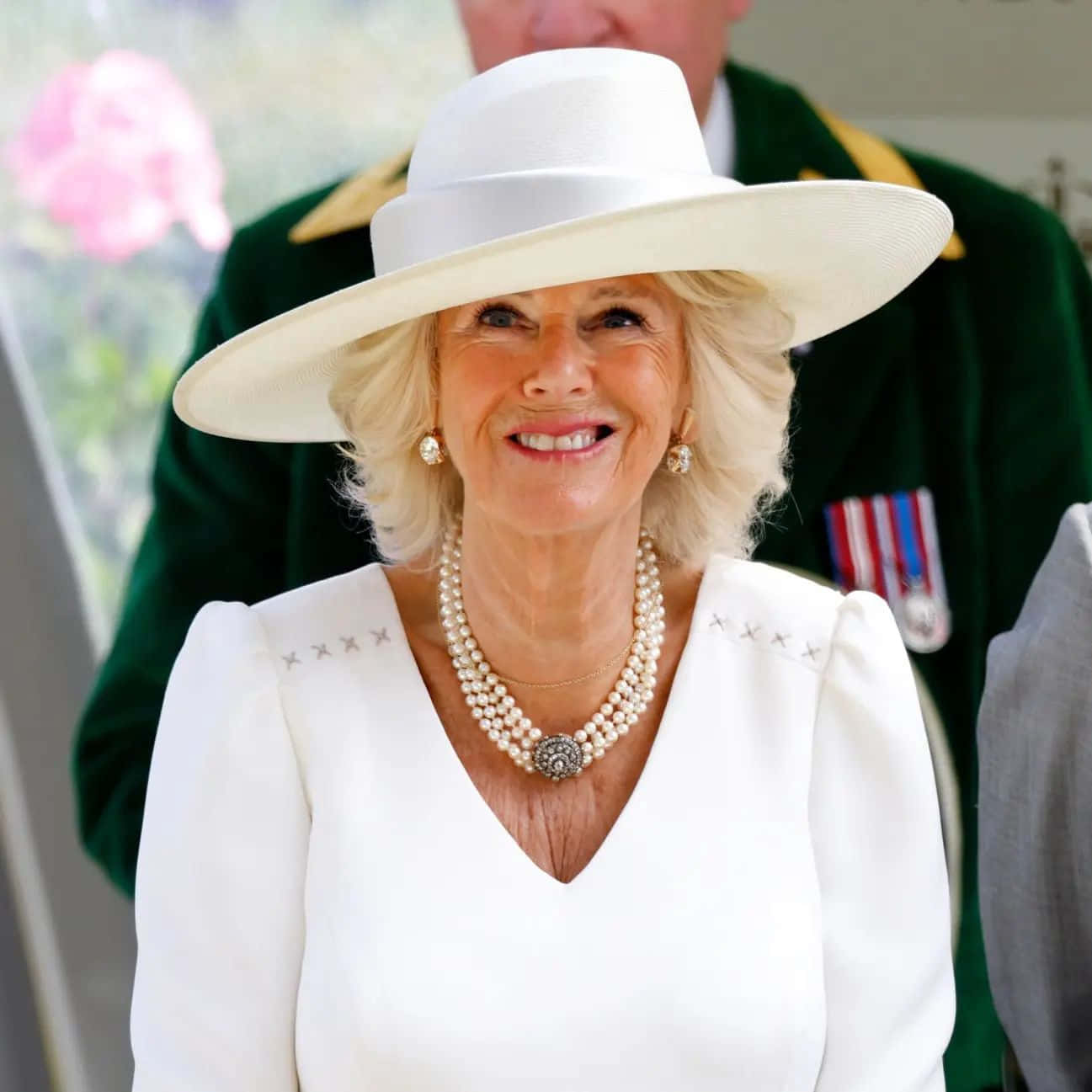 Queen Camilla In White Outfit Wallpaper