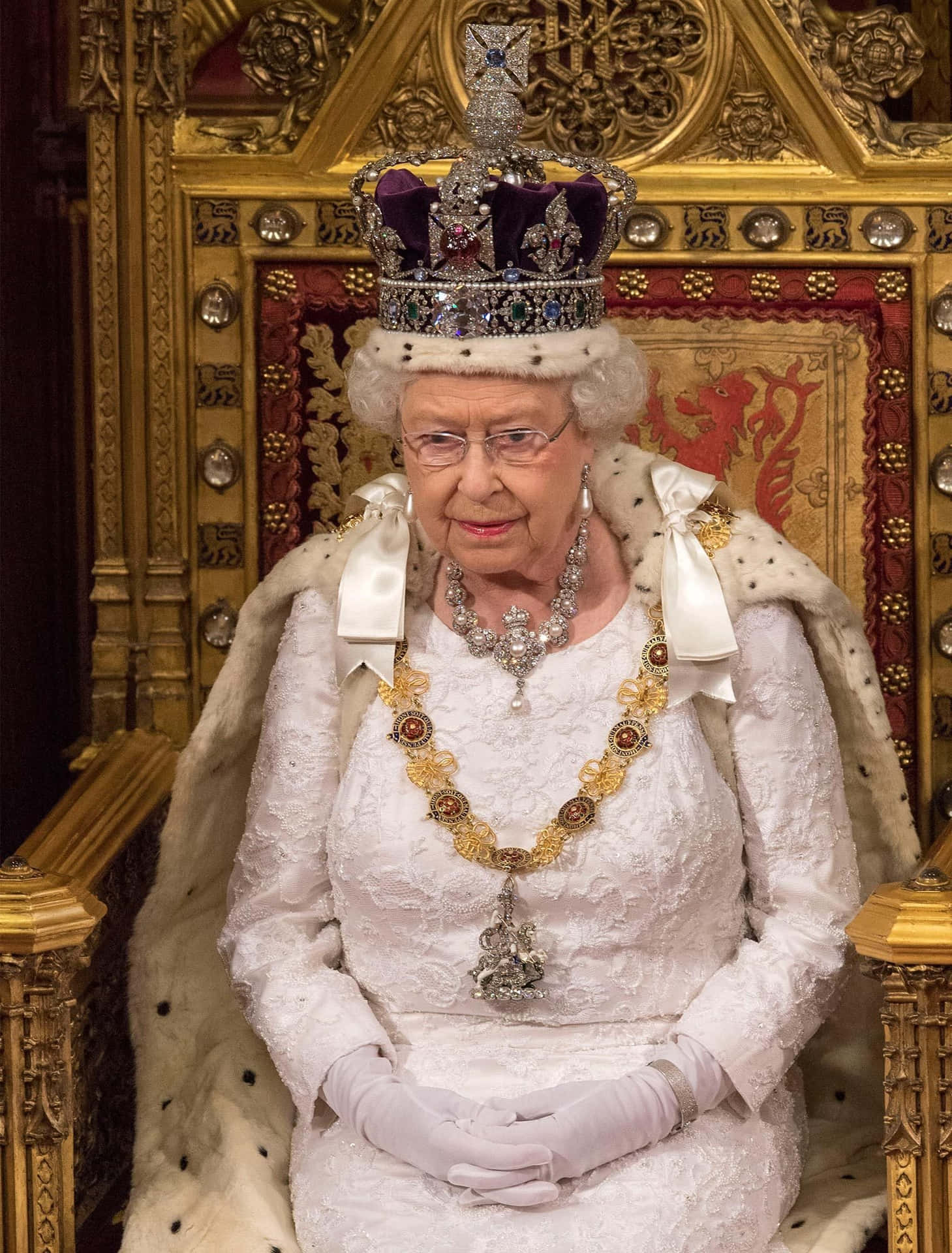 Queen Elizabeth Ii Sitting In A Chair In The House Of Commons