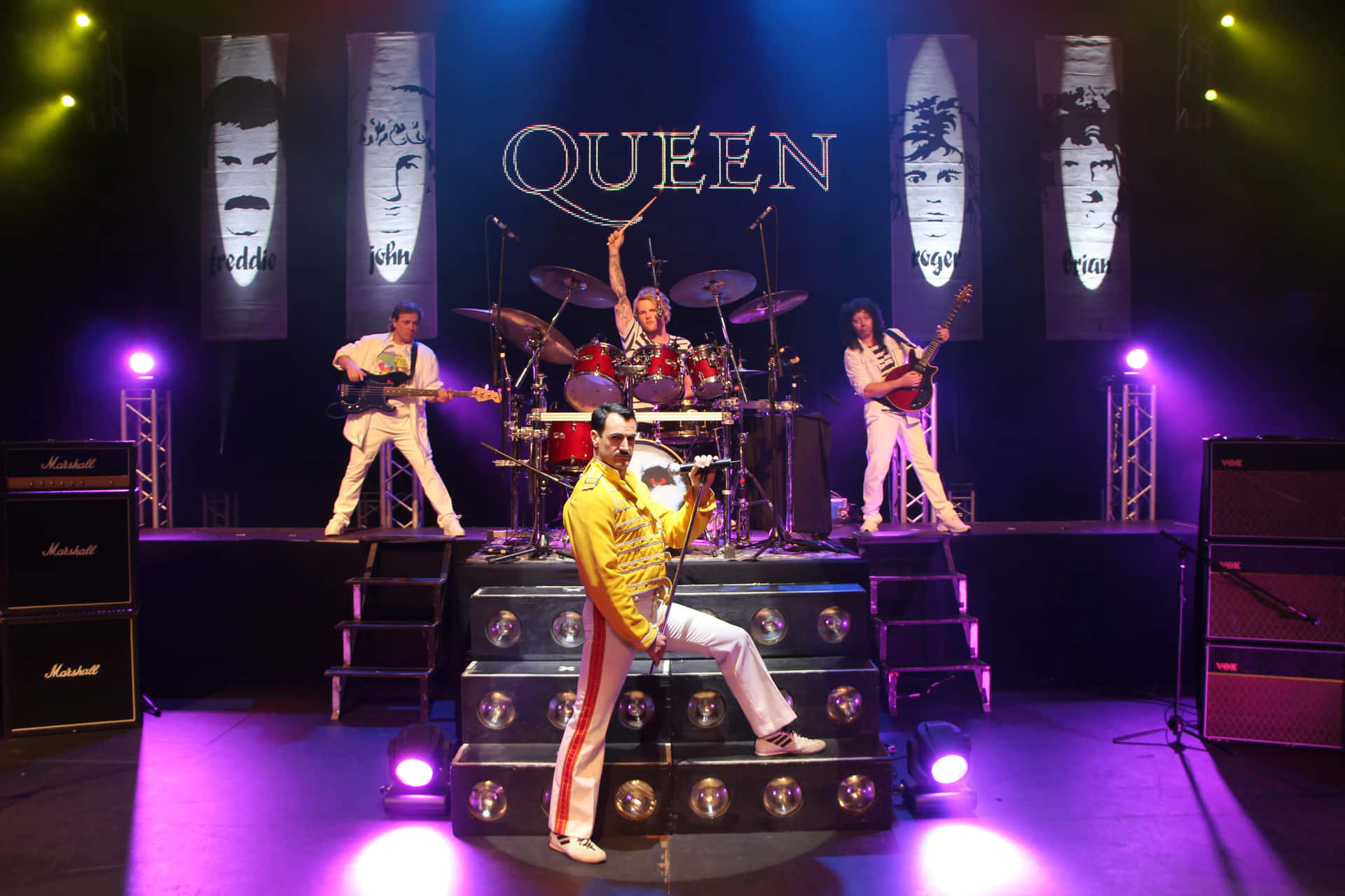 Queen On Stage With A Band On Stage