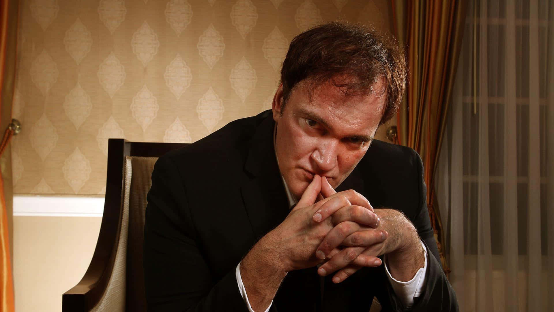 Quentin Tarantino Contemplative Pose Wallpaper