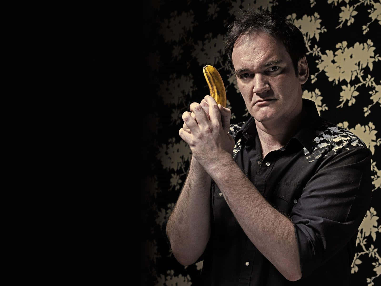 Quentin_ Tarantino_ Holding_ Banana Wallpaper