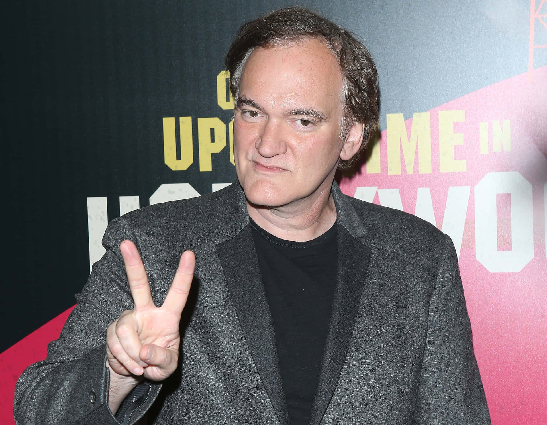 Quentin Tarantino Peace Sign Event Wallpaper