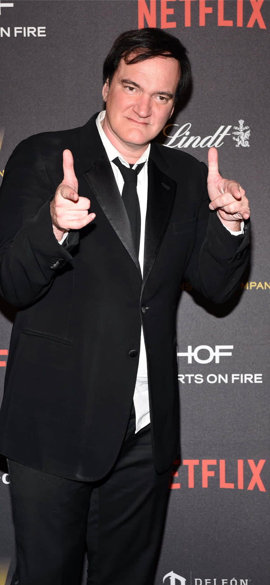 Quentin_ Tarantino_ Pointing_ Gesture_at_ Event Wallpaper