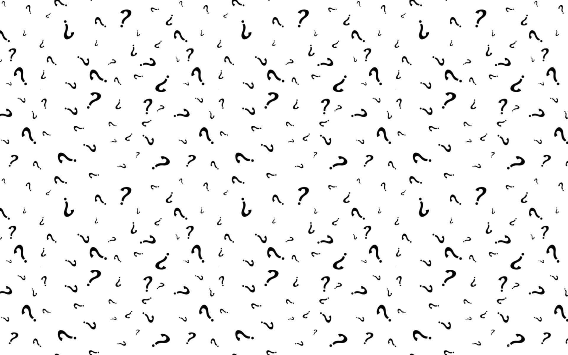 A Black And White Pattern With Question Marks