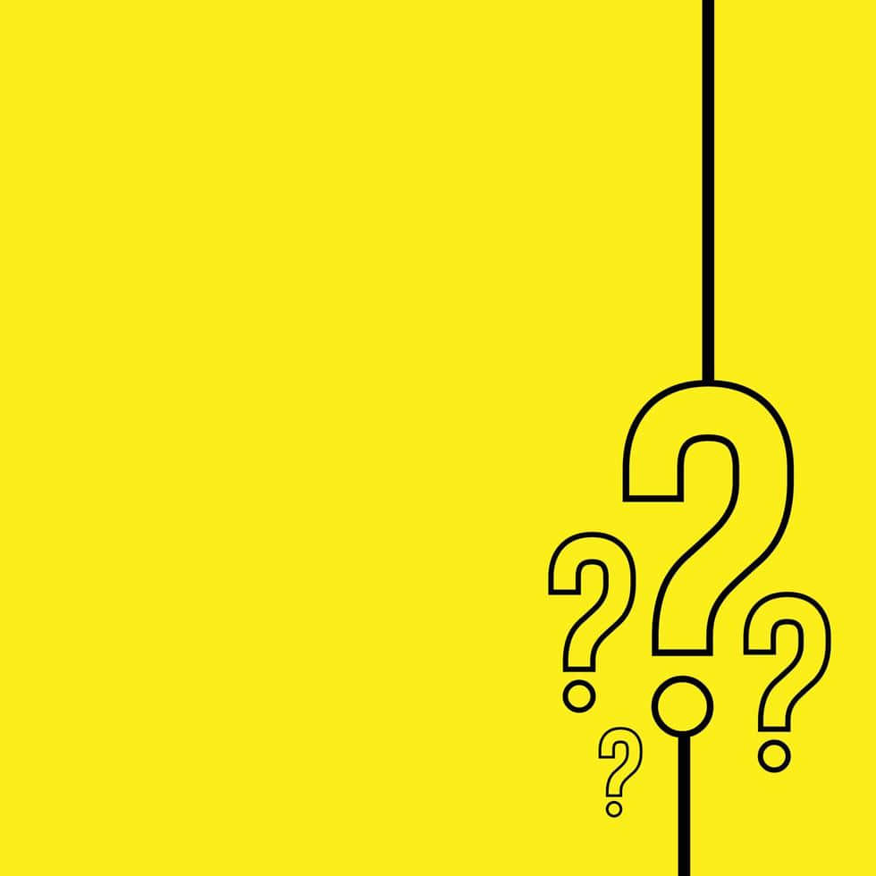 Single Question Mark on a Vibrant Yellow Background Wallpaper