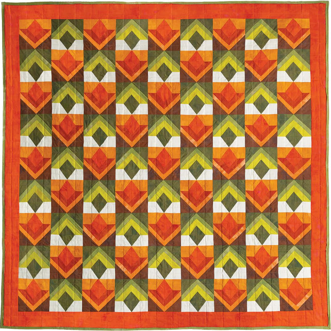 A bright and colorful quilt made with patchwork technique Wallpaper