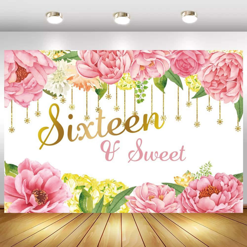 A Pink And Gold Backdrop With Flowers And A Banner