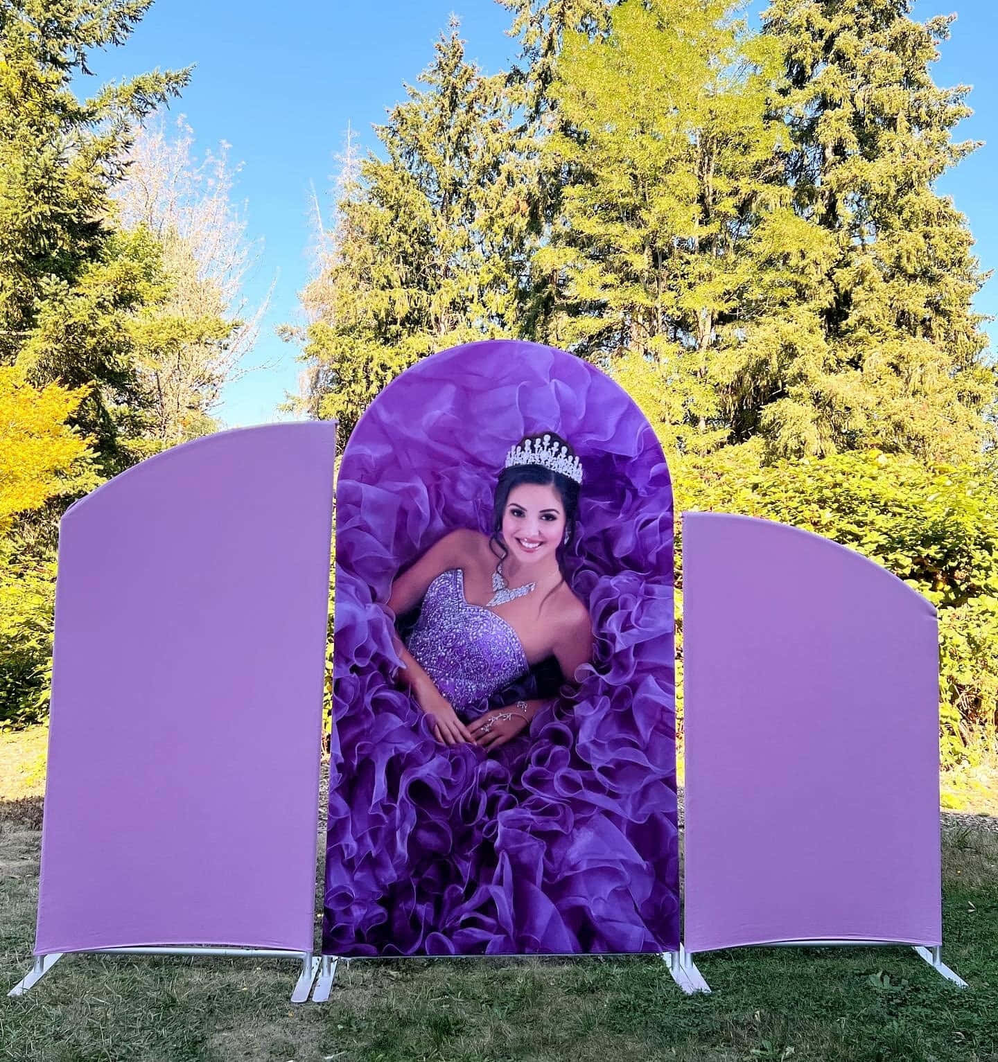 A Purple Backdrop With A Photo Of A Girl In A Purple Dress