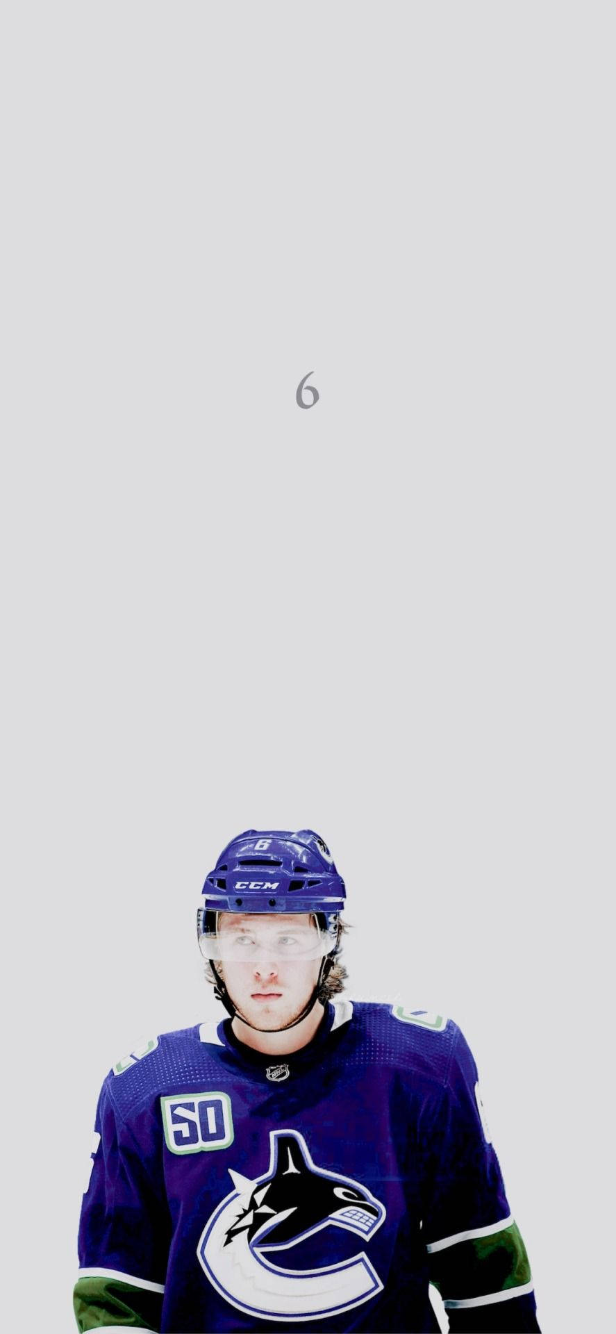 Quinn Hughes Looking In Front With White Background Wallpaper