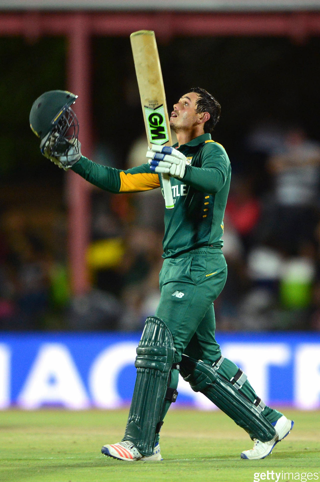 South African Cricketer Quinton De Kock Looking Up Intensely Wallpaper