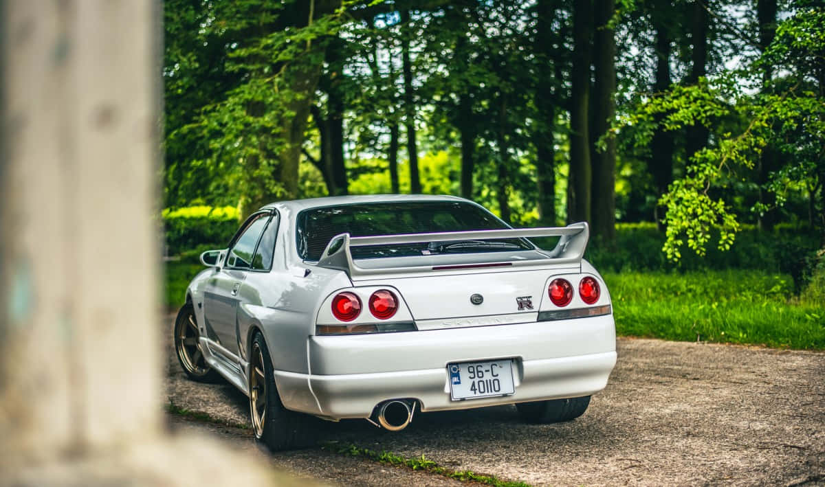 The Iconic R33 Gtr Manufactured By Nissan Wallpaper