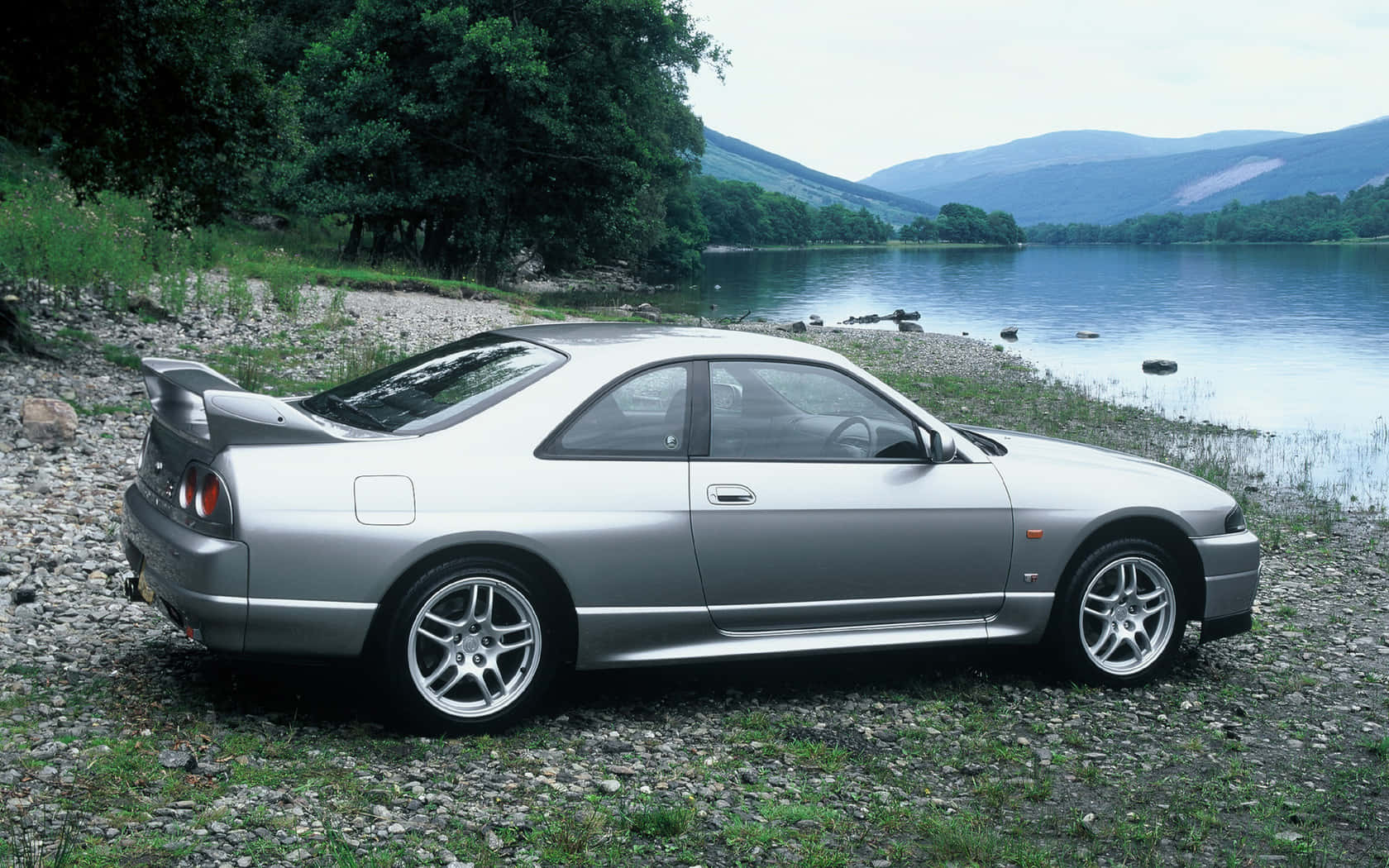 The Iconic Nissan R33 Gtr - An Unbeatable Classic Wallpaper