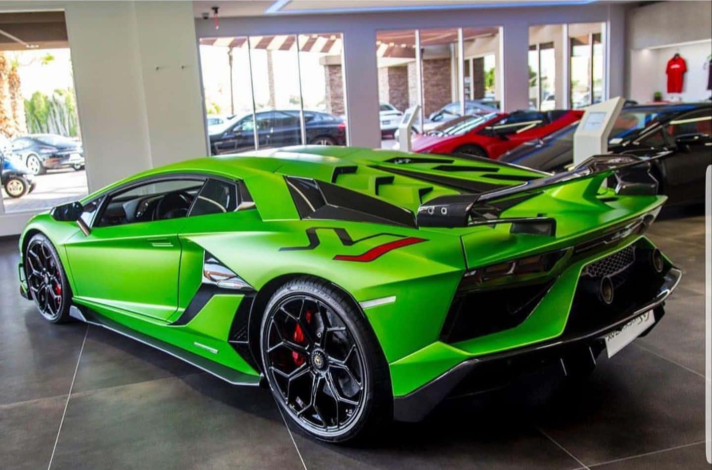 A Green Lamborghini Parked In A Showroom