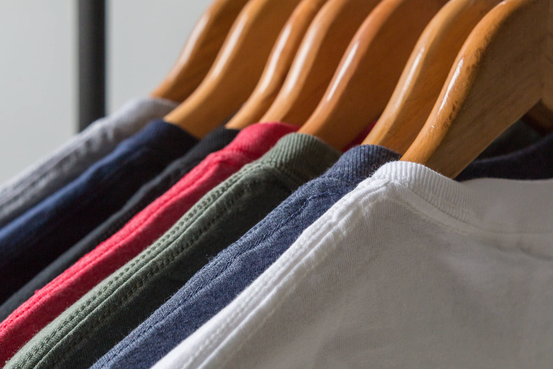 Rack Of Blank Shirts Close-up Background