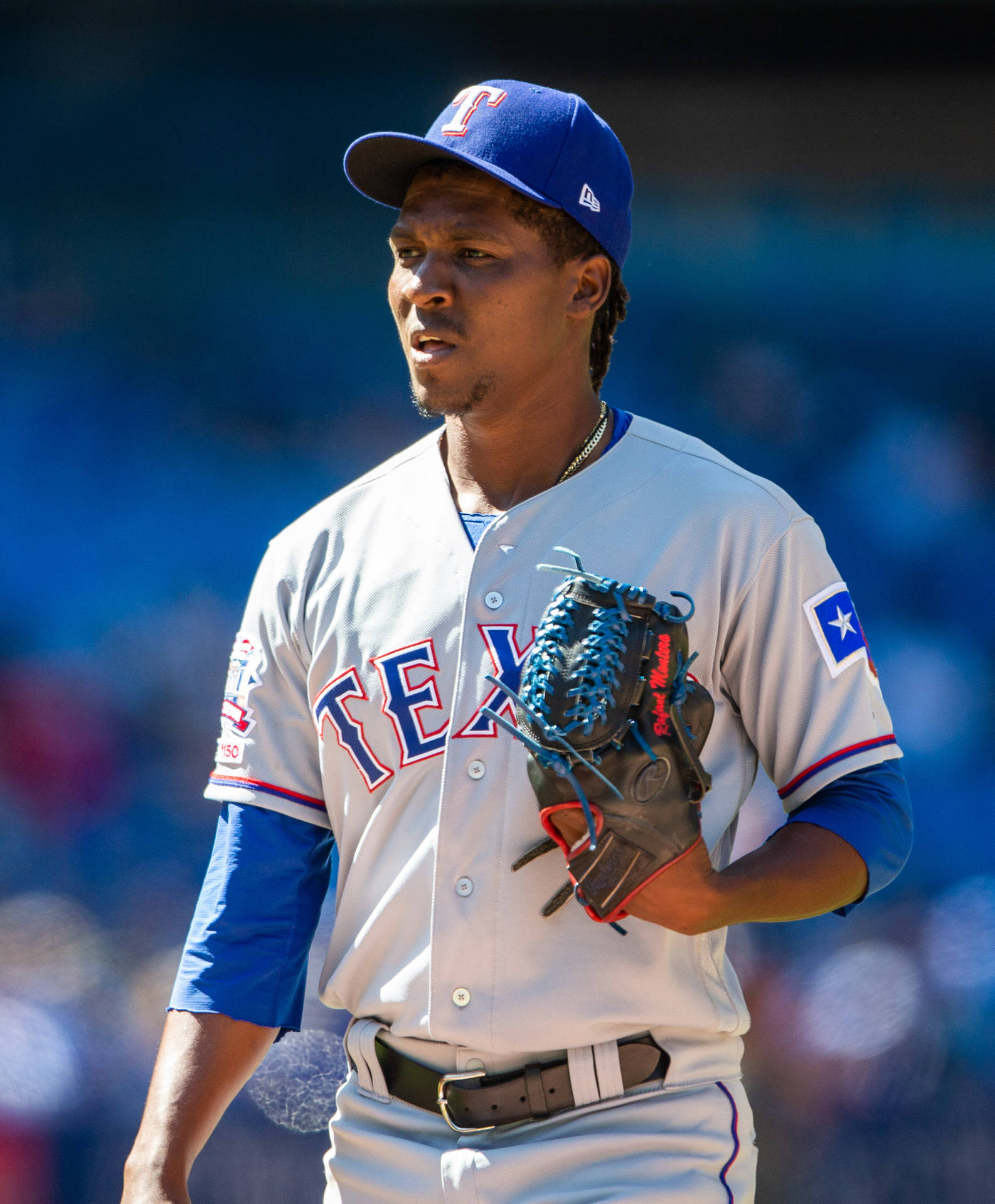 Rafaelmontero Bär Texas Rangers Uniform På Sin Dator- Eller Mobilskärmsbakgrund. Wallpaper