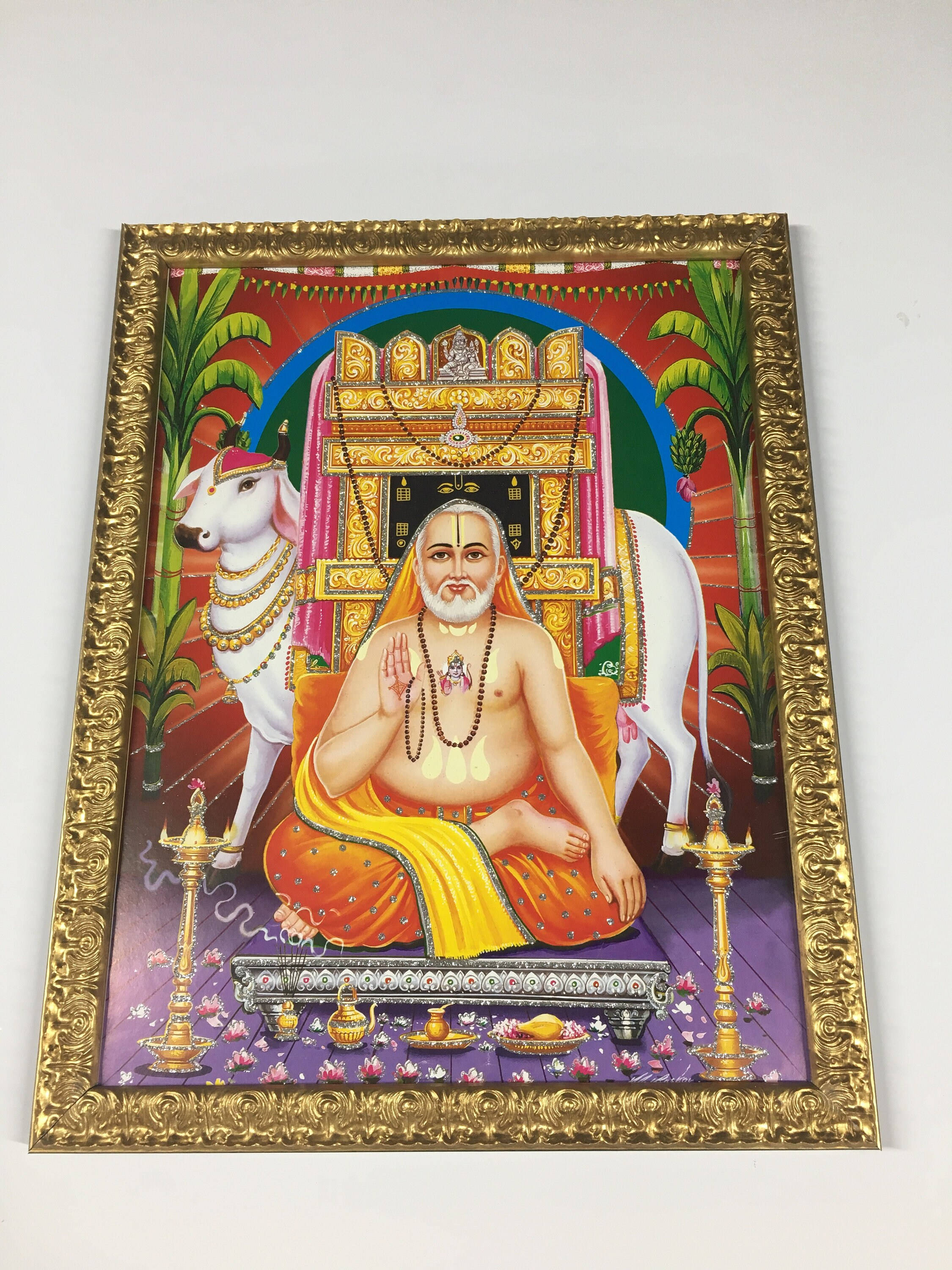Raghavendra Painting In Gold Frame Wallpaper