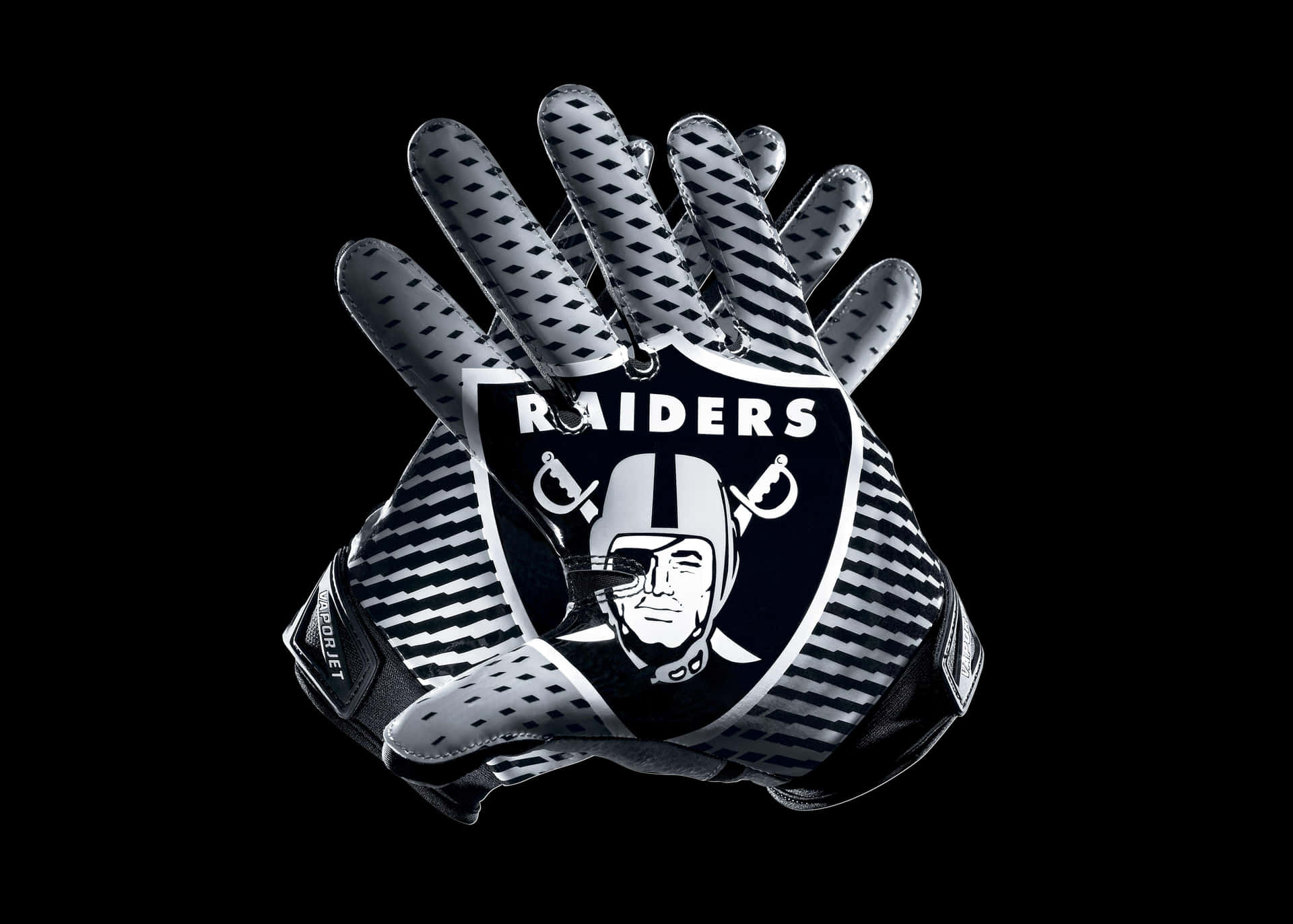 Logodei Raiders Su Guanti A Strisce Da Football. Sfondo
