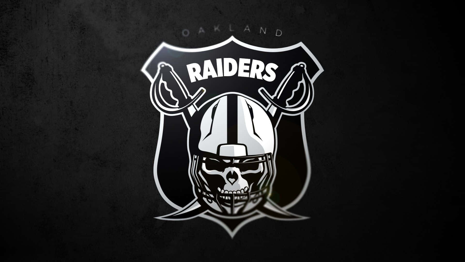 Logotipode Los Raiders En Color Plateado Y Negro Con Letras Blancas. Fondo de pantalla
