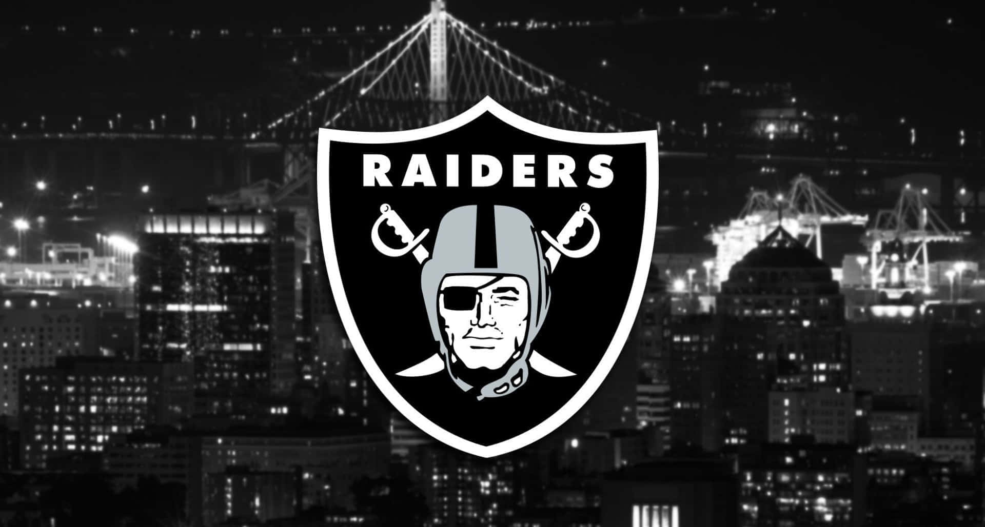 Raiders Night Cityscape Logo Wallpaper
