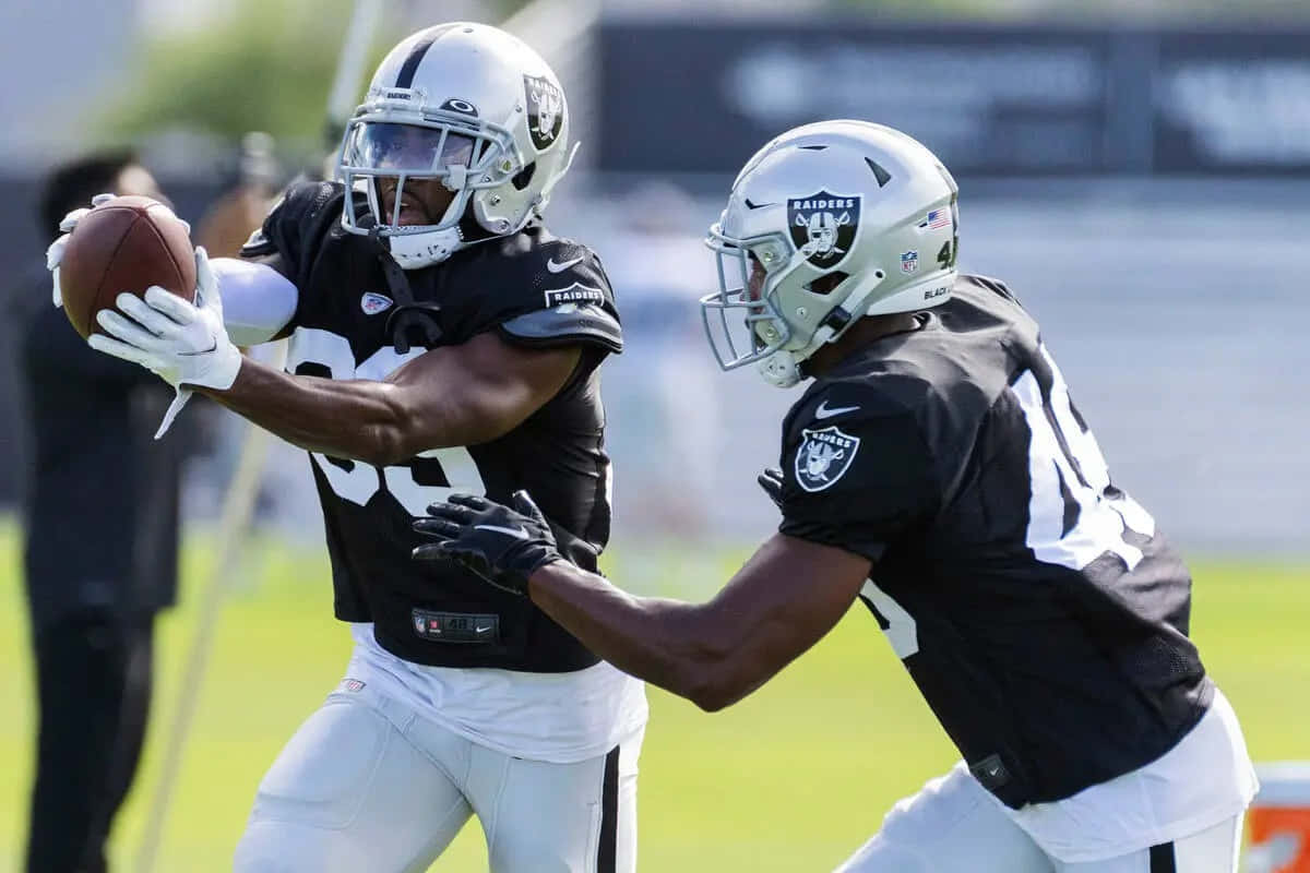 Raiders Practice Session Catch Wallpaper