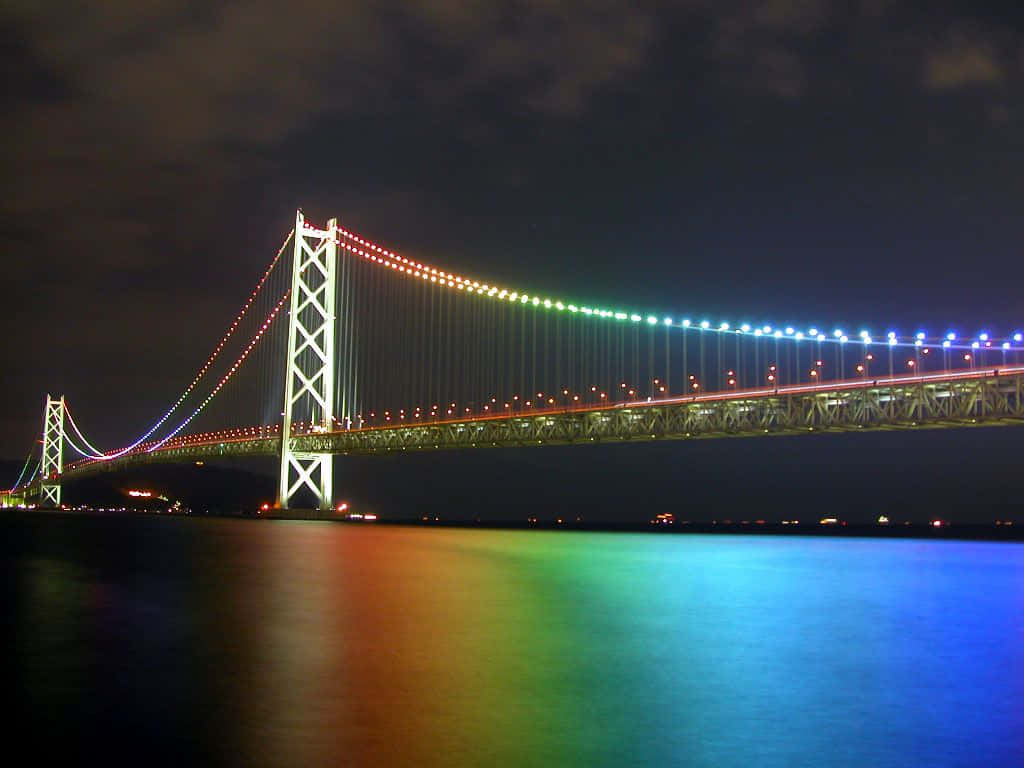 "Beautiful rainbow colors reflecting across this peaceful bridge scene."
