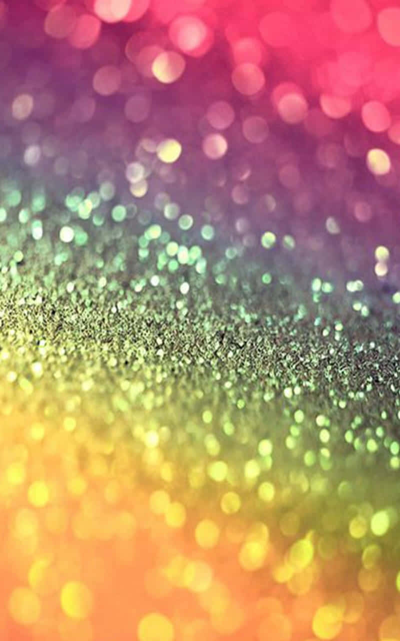 En lyseblinkende regnbue af glimmer Wallpaper