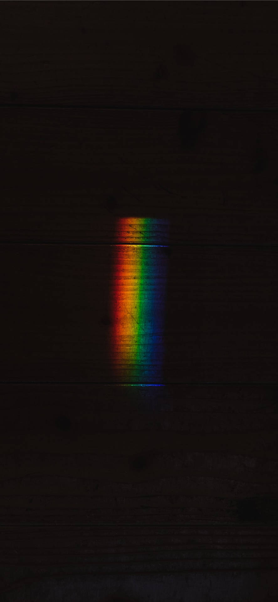 Regenbogenlichtauf Schwarzem Apple Iphone Wallpaper