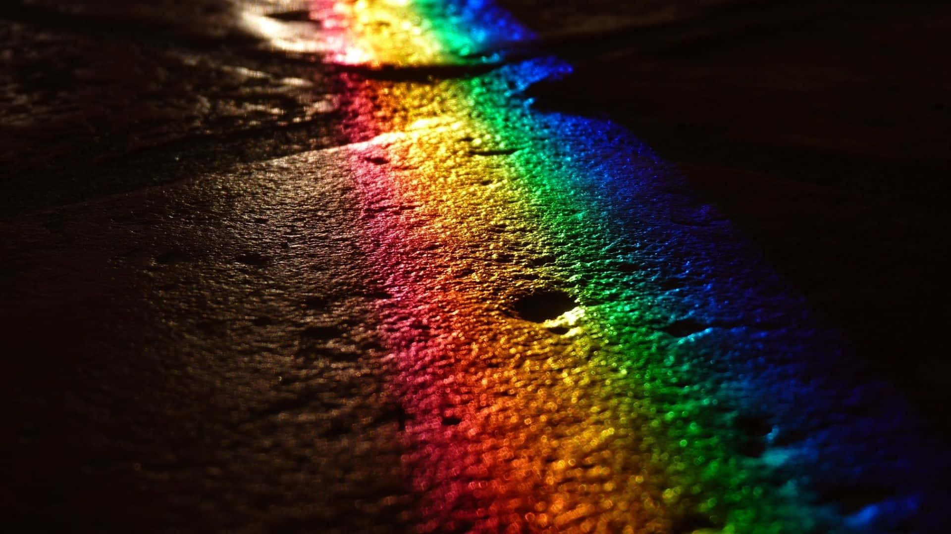 Rainbow Light Reflectionon Surface Wallpaper