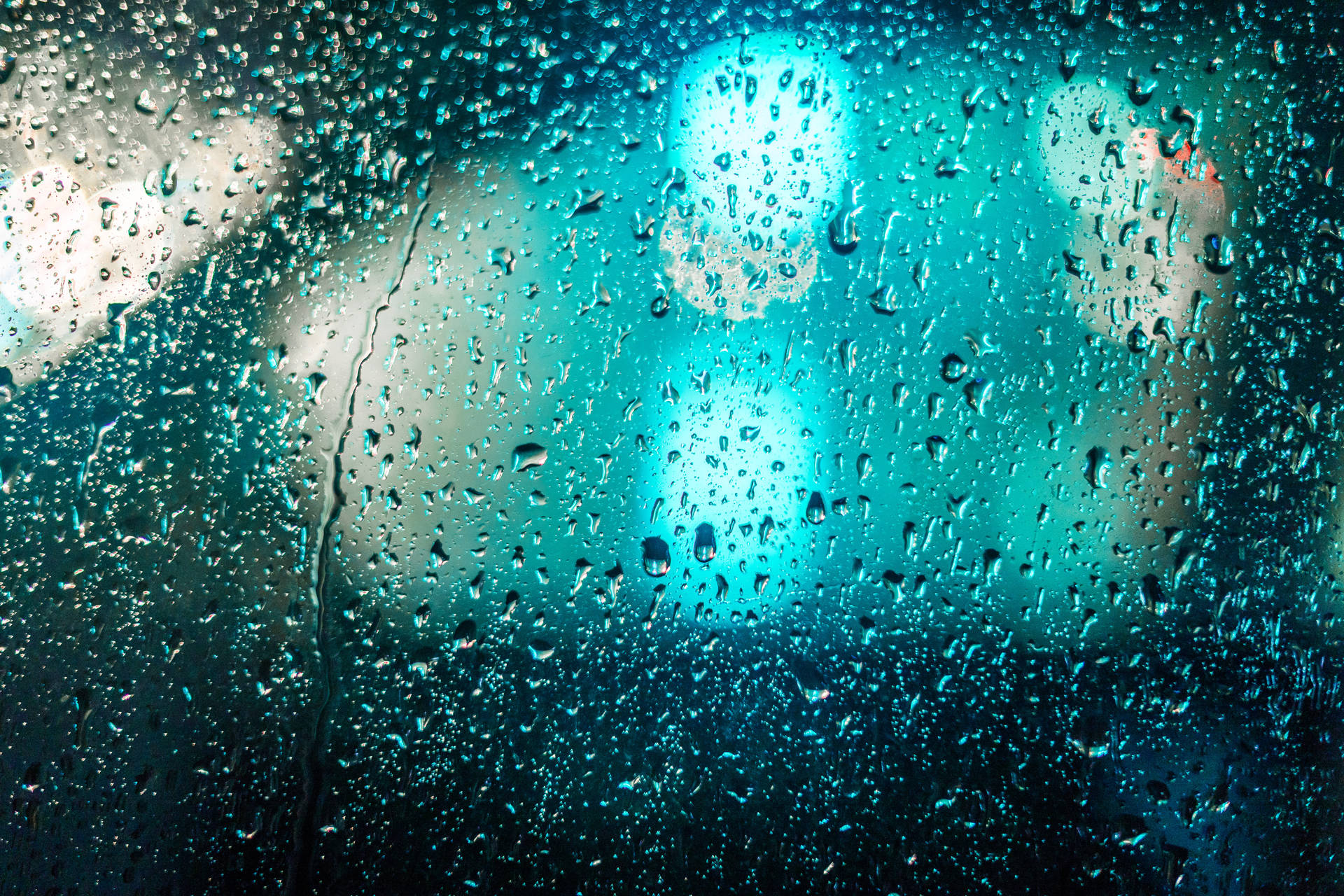 Raindrops on a Desktop Computer Screen Wallpaper