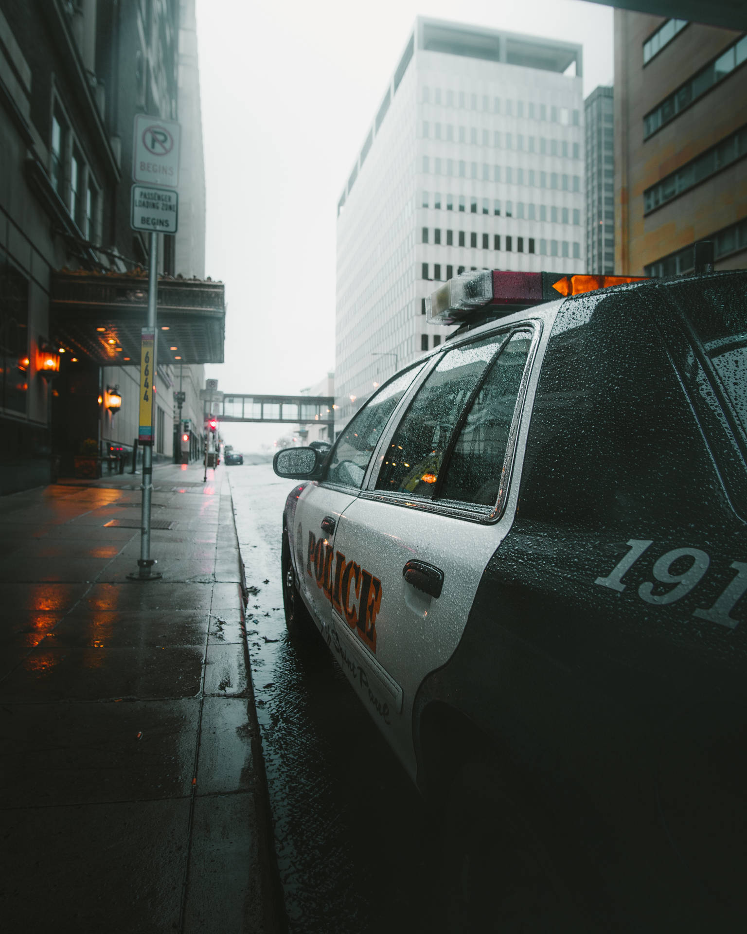 Raining City Police Car Wallpaper