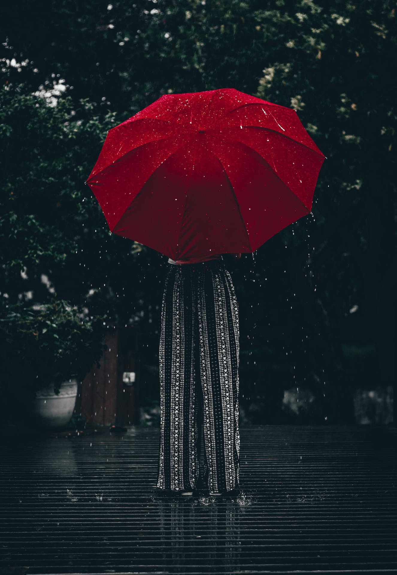 Raining Down On A Red Umbrella Wallpaper