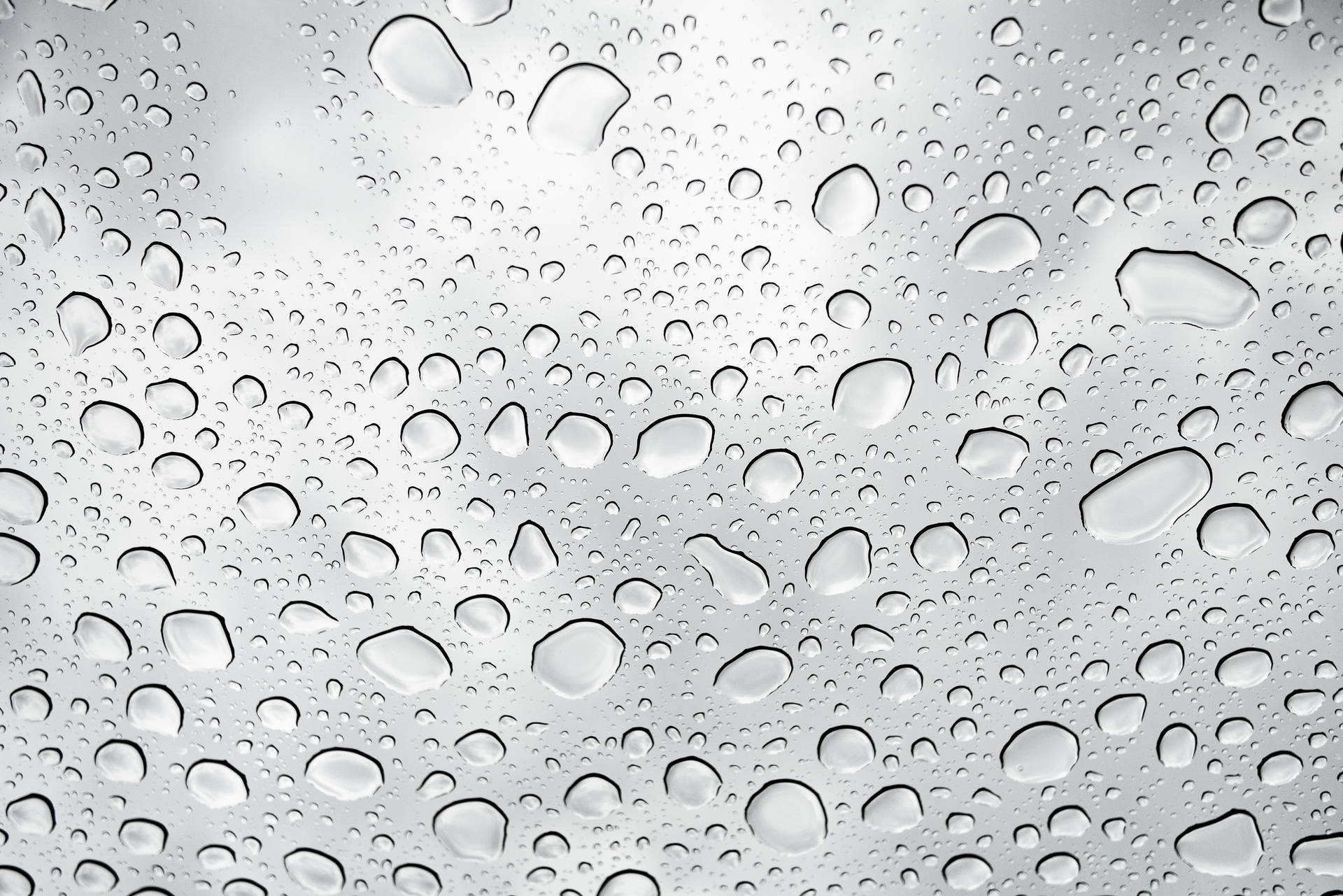 Raining Droplets On Glass Surface Wallpaper