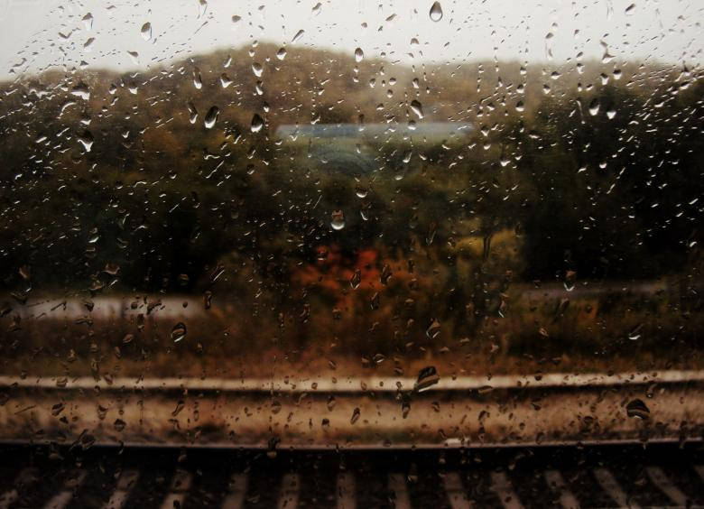 Raining On Train Tracks Wallpaper