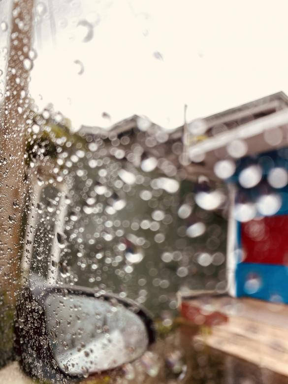 Raining Outside The Car Wallpaper