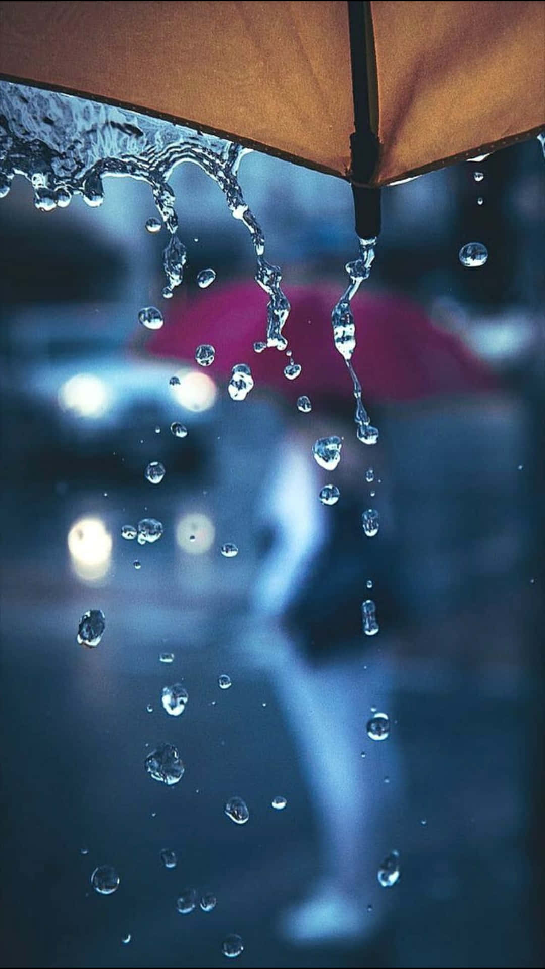 Umbrella Edge With Rain On A Rainy Day Picture