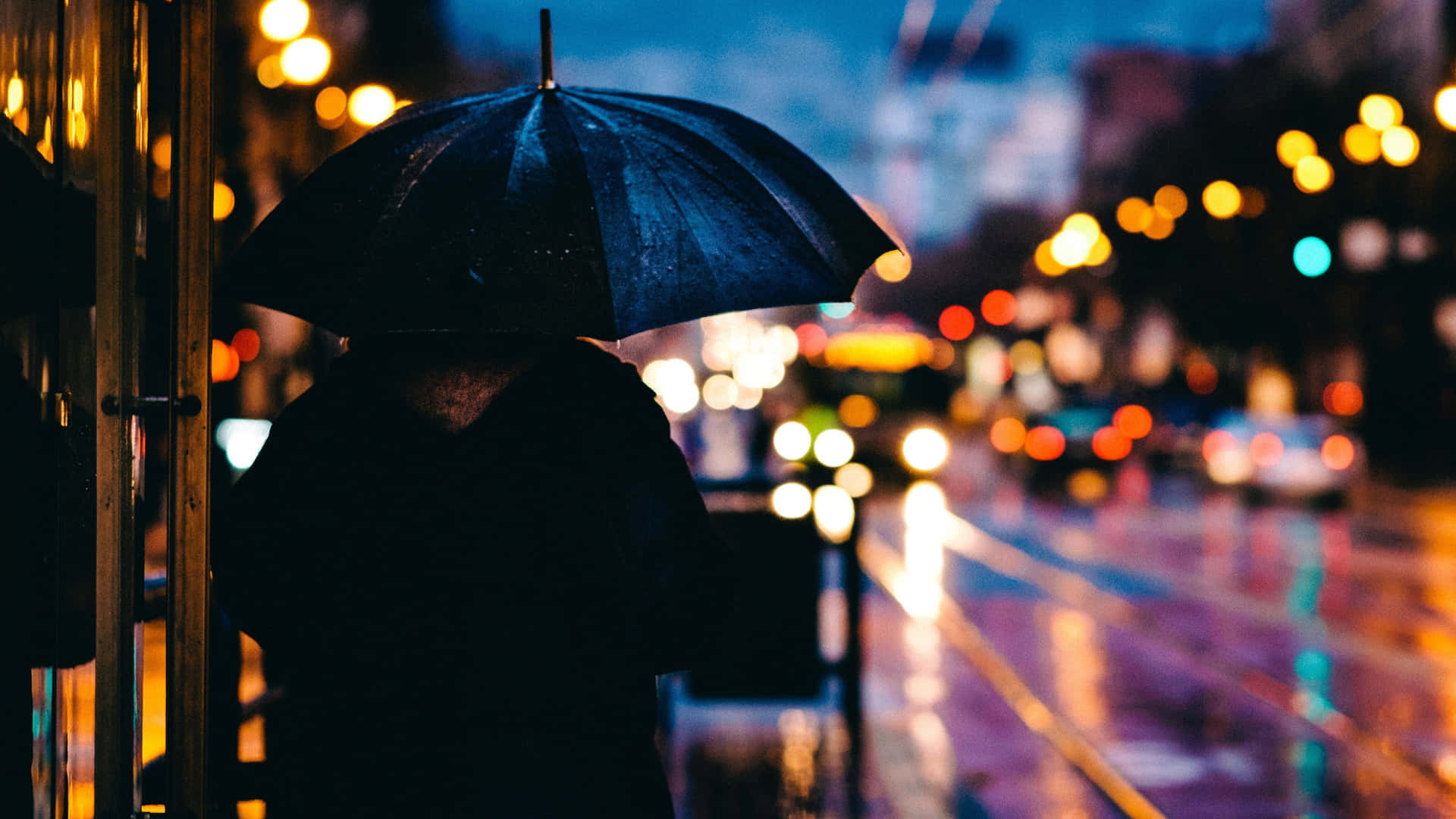 Rainy Night City Lights Umbrella Wallpaper