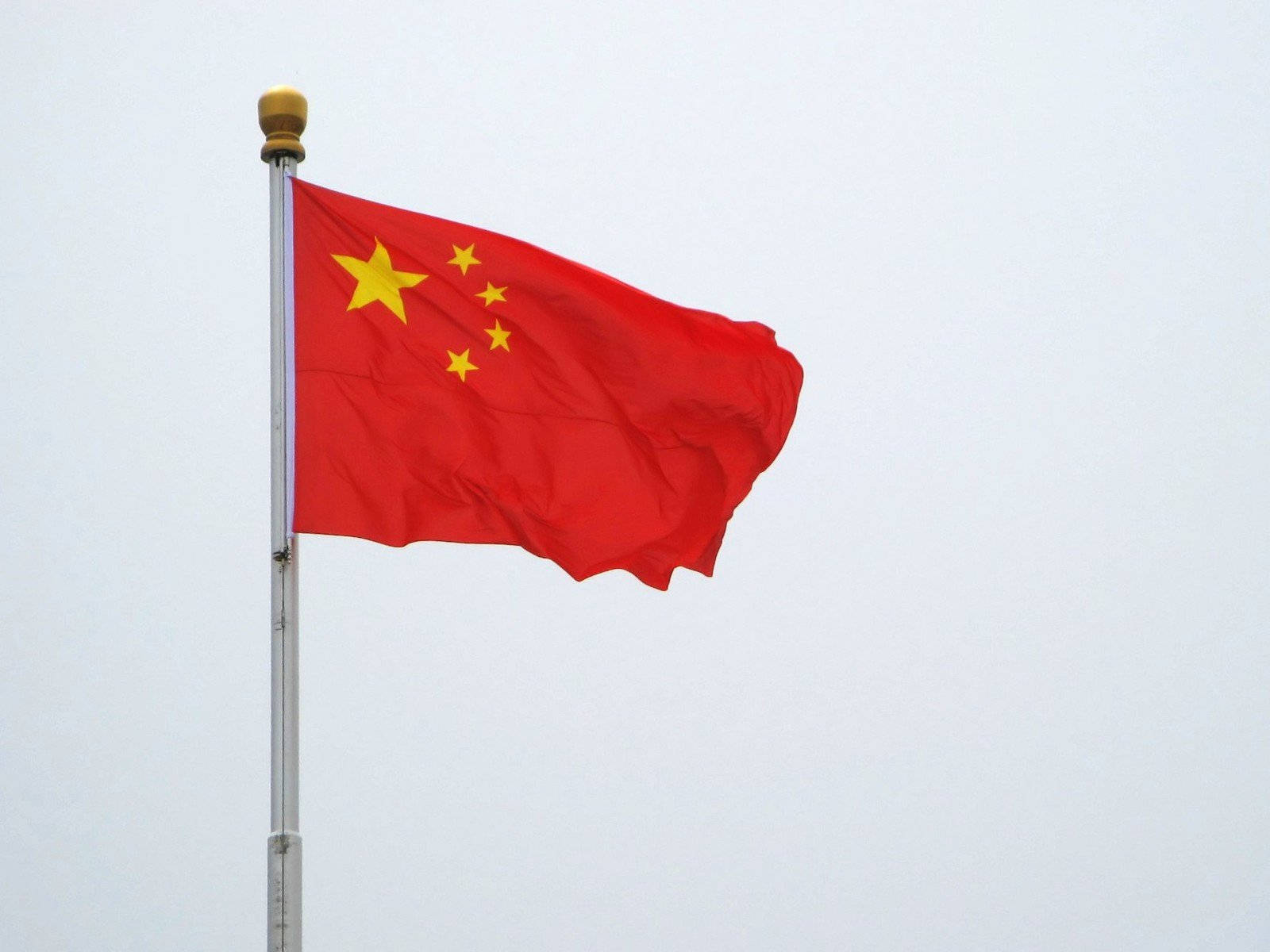 Raised China Flag Background