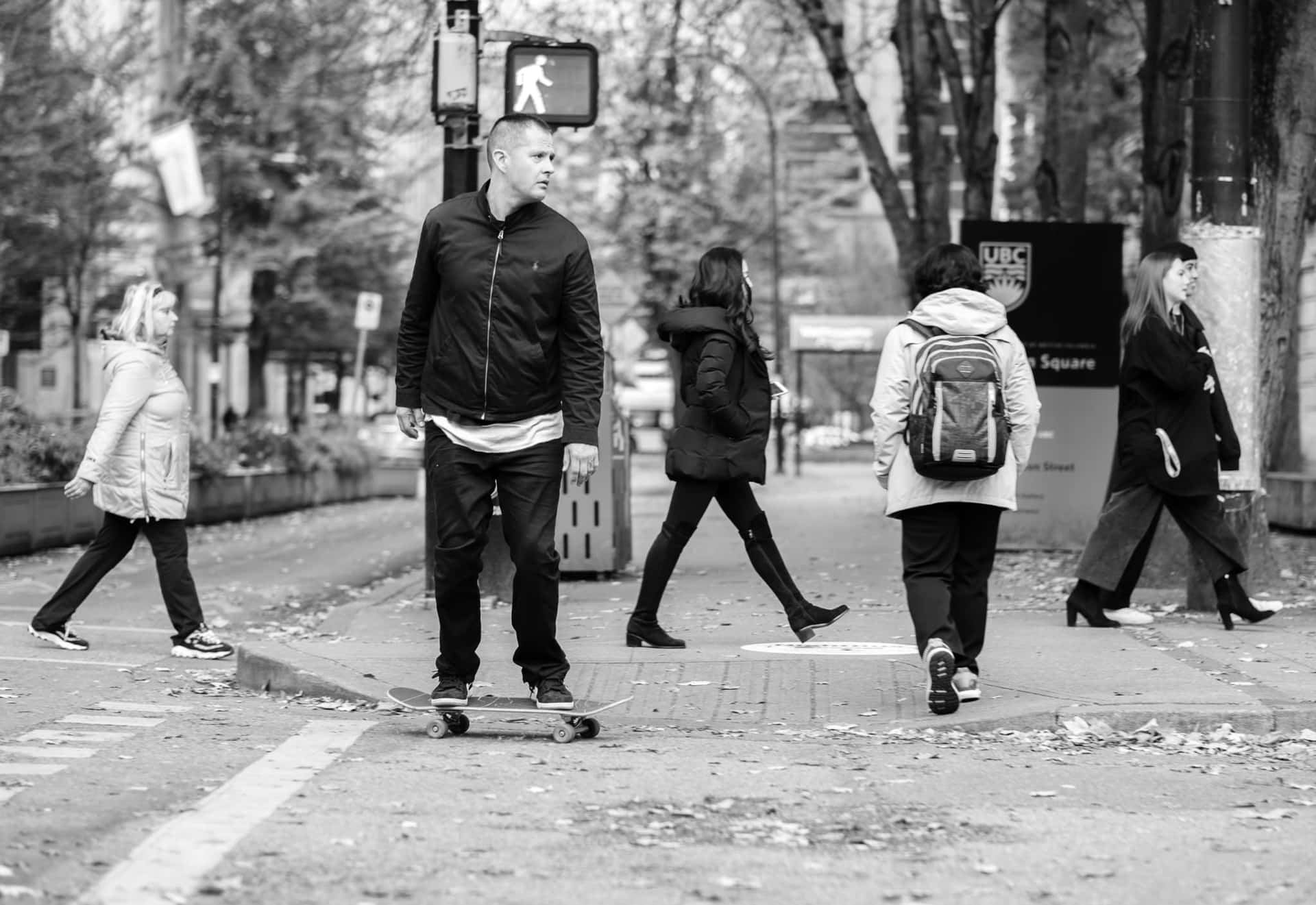 Random People Crossing A Street Background