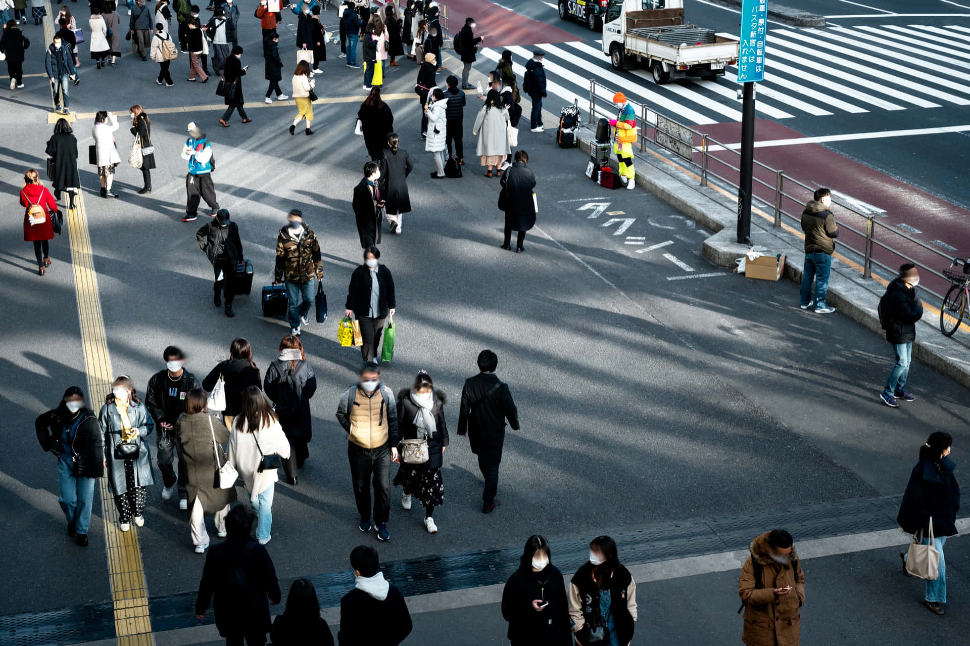 Random People Walking On Tokyo Streets Wallpaper