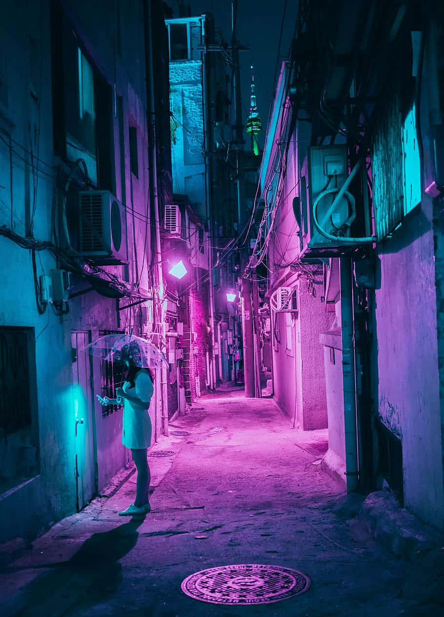 Random Person In Alley With Purple Lights Wallpaper