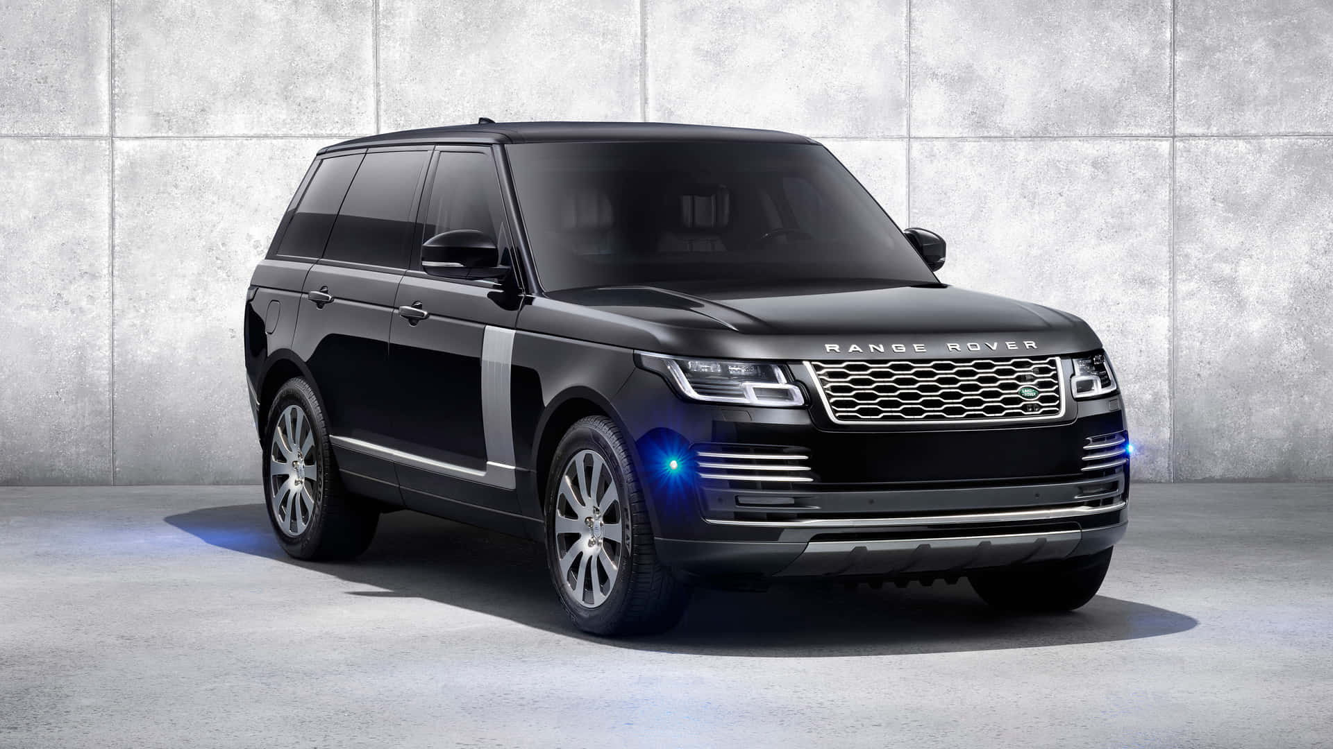 The New Range Rover Vogue Is Shown In A Black Color