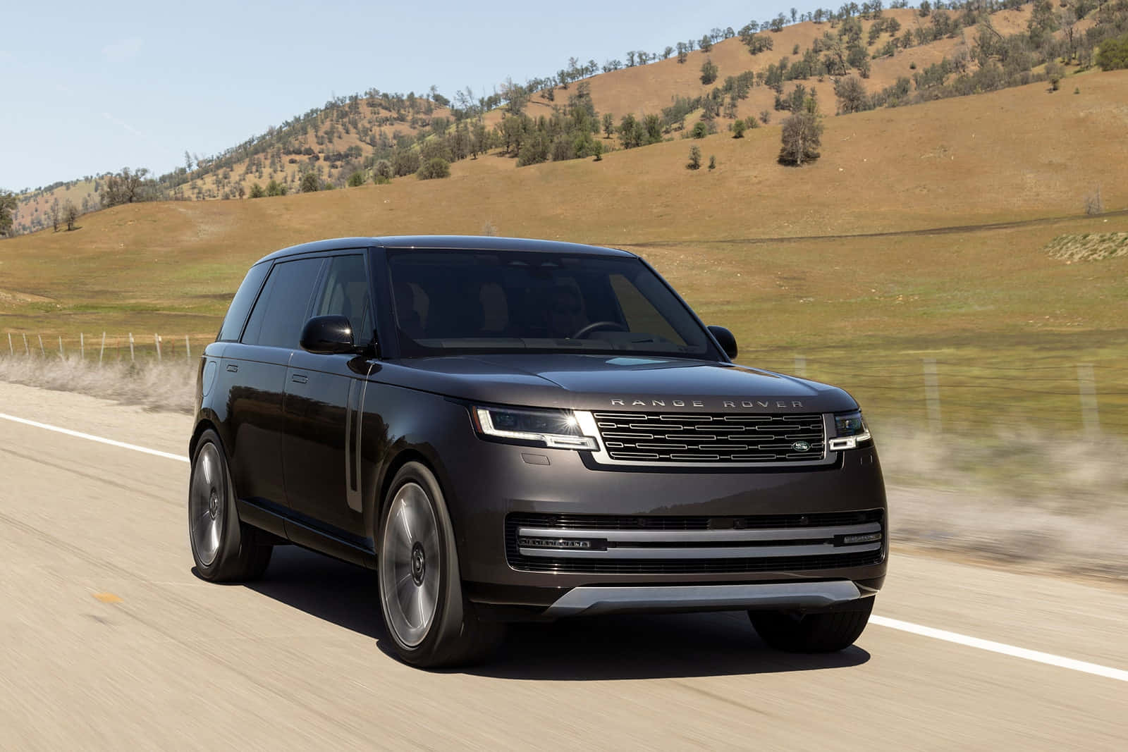 The New Range Rover Vogue Is Driving Down The Road