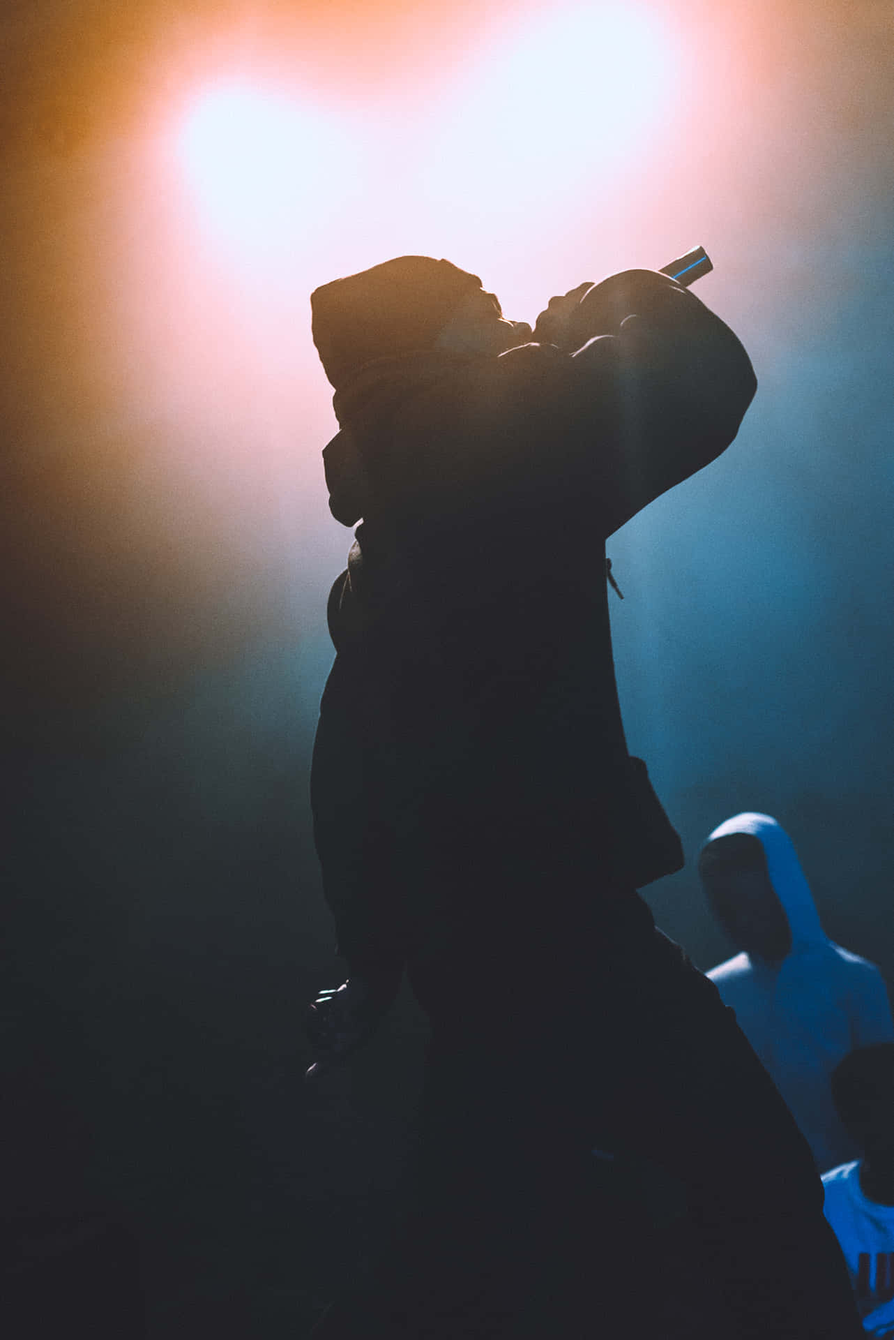 Hintergrundmit Der Silhouette Eines Rap-künstlers