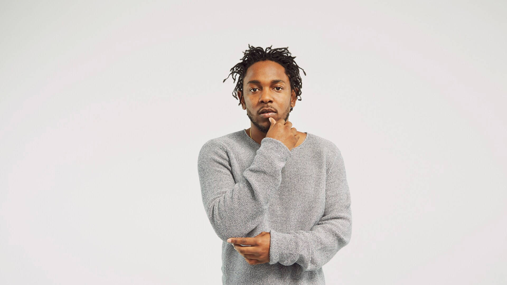 Rapper Kendrick Lamar In Gray Background