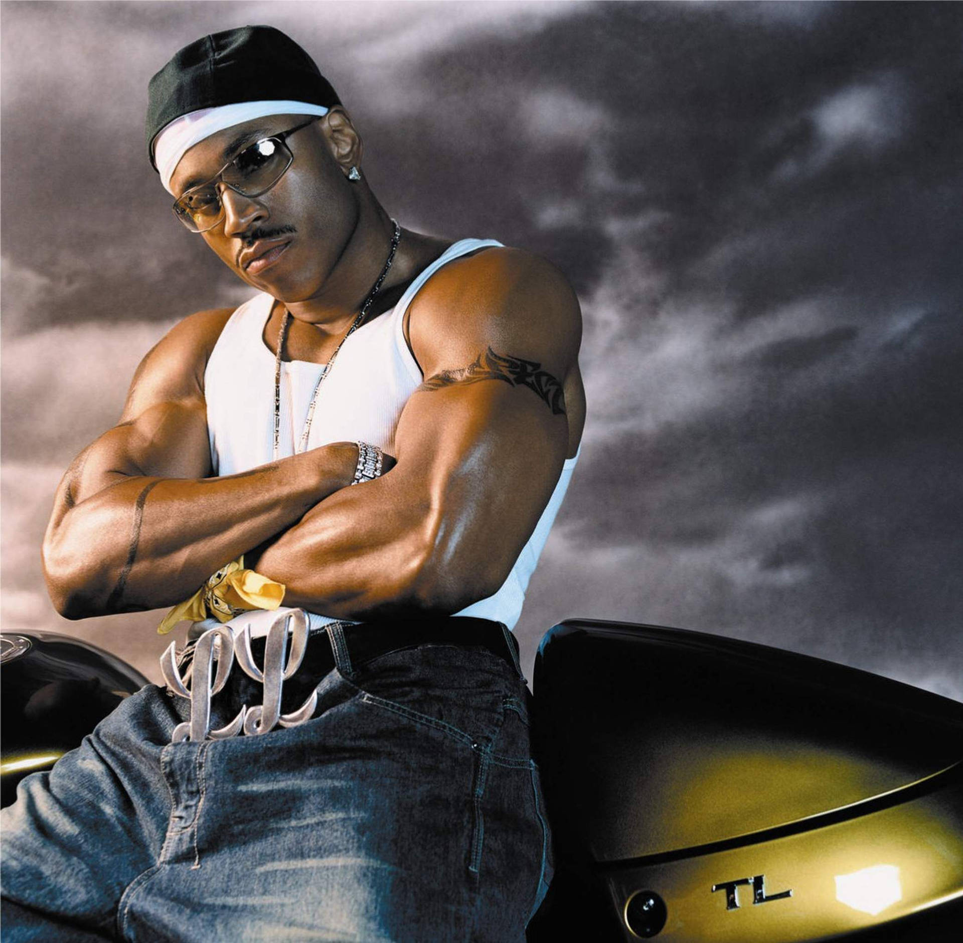 The versatile rapper LL Cool J in dynamic action. Wallpaper
